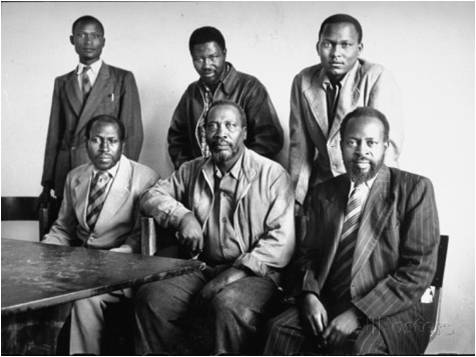 http://imgc.allpostersimages.com/images/P-473-488-90/48/4884/VCP8G00Z/posters/alfred-eisenstaedt-kenya-story-mau-mau-leader-jomo-kenyatta-posing-with-five-of-his-staff-members-during-trial.jpg
