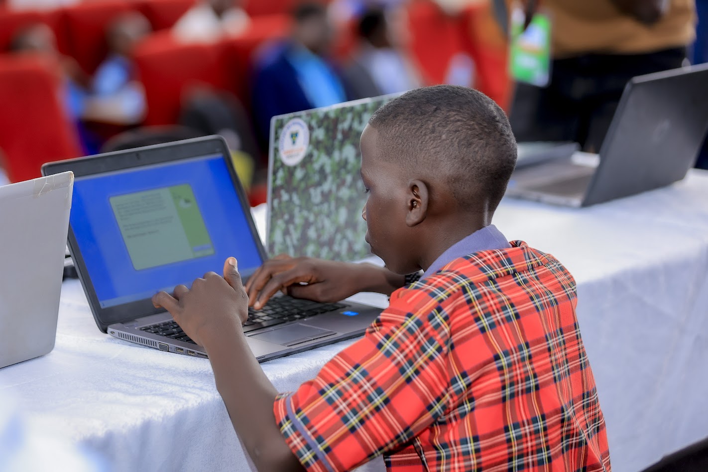 ICT club students collaborating on technology projects