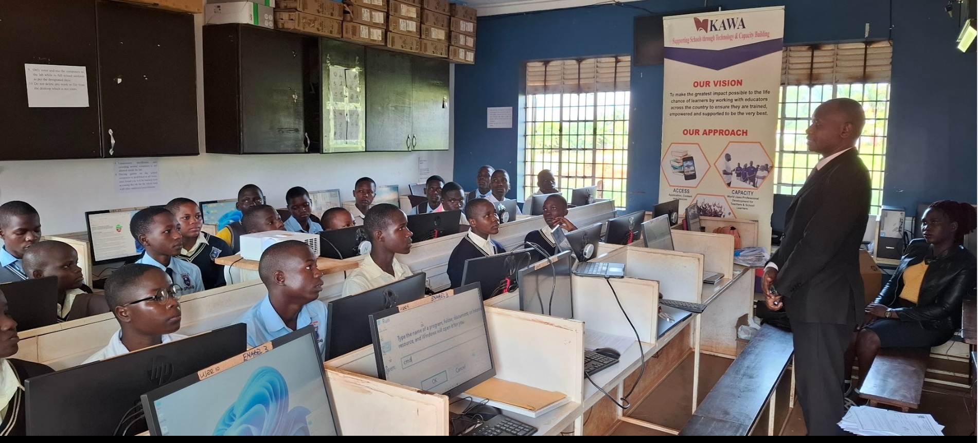 Students of Mpumudde Seed SS learning ICT in Uganda secondary school