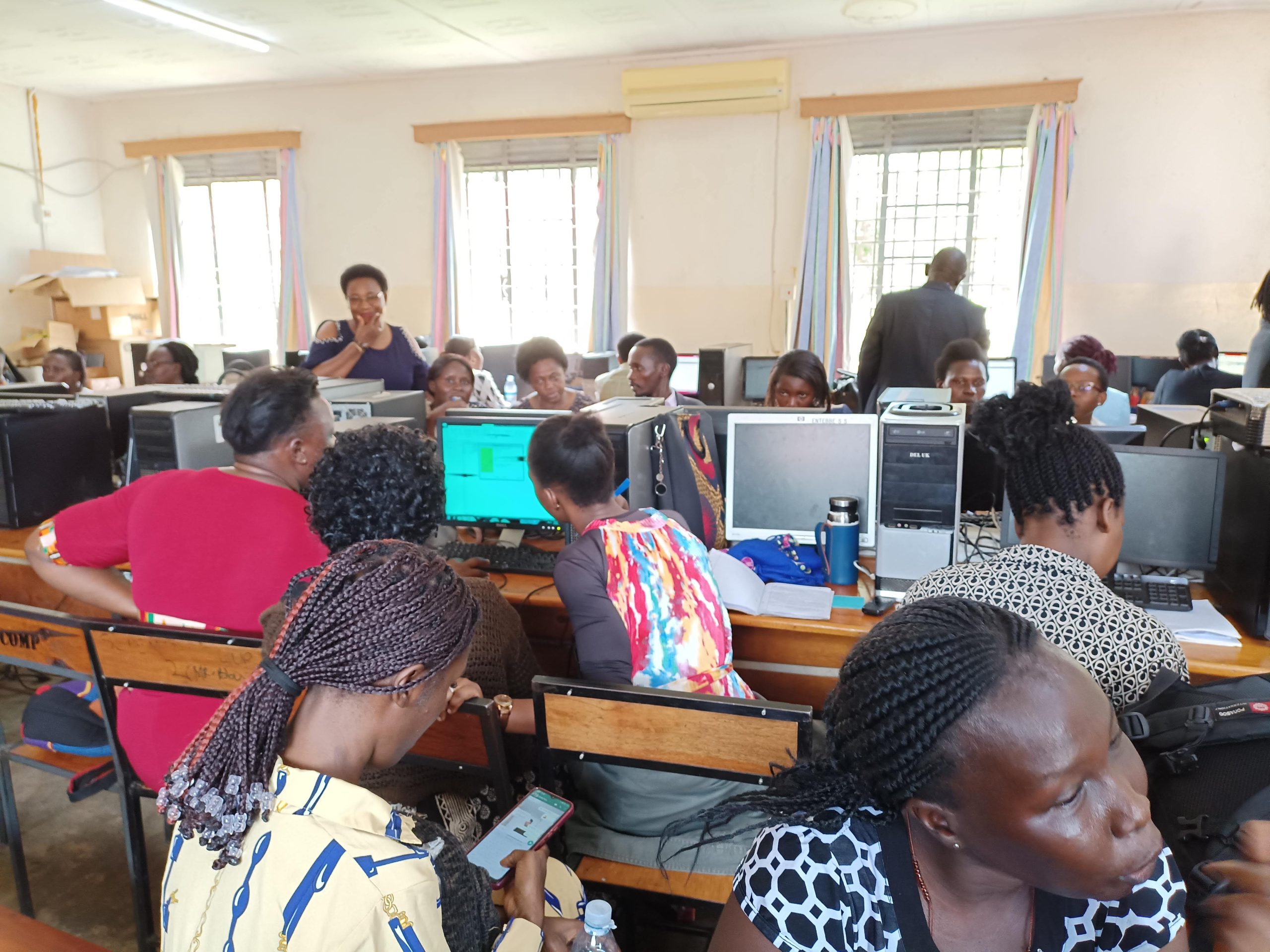 Teachers and educators in Uganda in a practical digital literacy and online safety workshop